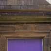 Detail of carved stone 'Girls' above W entrance, from S.