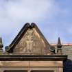 Detail of pediment above second floor window from S.