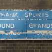 Detailed view of signage at the southwest corner of Meadowbank Stadium.