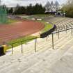 View looking northwest along the bench seating at Meadowbank Stadium.