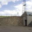 Detailed view of stairway and stone walled embankment at the southwest entrance to Meadowbank Stadium.