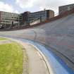View of the track and seating at Meadowbank velodrome, Edinburgh, looking southeast to Meadowbank House.