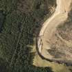 Oblique aerial view centred on the road block, taken from the E.