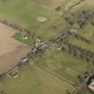 Oblique aerial view centred on the Riding Stables with the Home Farm and North Lodge adjacent, taken from the SW.