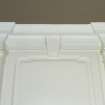 Interior. Detail of upper section of mantelpiece and cornice