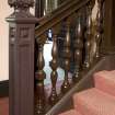 Interior. View of newel post and bannister to main stair