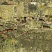 Detail of underside of bridge arch showing damaged brickwork.