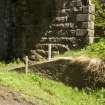 Detail of lower section of bridge abutment and platform end from SW.