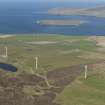 General oblique aerial view centred on a wind farm on Burgar Hill with Eynhallow Sound and Rousay beyond, taken from the S.