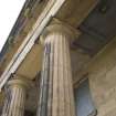 Detail. View looking up to column capitals and panelled ceiling space, main entrance portico