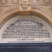 Detail from inscription on facade at entrance to Necropolis.