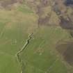 Oblique aerial view centred on the ruined farmsteads of Burness, Castlehill, Turbitail, Upper Burness and Whitemeadows, taken from the SE.