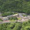 Oblique aerial view of New Lanark centred on the roof garden, taken from the NE.