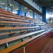 Interior view of Royal Commonwealth Pool, Edinburgh. Oblique view along spectator seating bank at SE end of main pool hall.