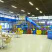Interior view of Royal Commonwealth Pool, Edinburgh. View of snack bar at NE end of main concourse, including children's soft play area additions.