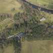 Oblique aerial view centred on the country house with the walled garden adjacent, taken from the SW.