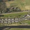 Oblique aerial view centred on Tweedholm Avenue East, taken from the S.