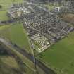 General oblique aerial view of the town with the railway viaduct adjacent, taken from the E.