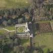 Oblique aerial view centred on the tower/country house with the garden adjacent, taken from the SSE.