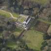 Oblique aerial view centred on the tower/country house with the garden adjacent, taken from the E.