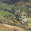 General oblique aerial view centred on the country house, taken from the WNW.