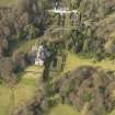 Oblique aerial view centred on the country house with the walled garden adjacent, taken from the S.