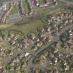 Oblique aerial view centred on the Kettils'toun Mains housing Estate, taken from the SW.