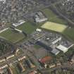 Oblique aerial view centred on Linlithgow Academy with the football ground, taken from the W.