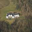 Oblique aerial view centred on the house, taken from the SSW.