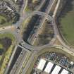 Oblique aerial view centred on the motorway interchange, taken from the (vertical) SE.
