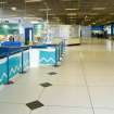 Interior view of Royal Commonwealth Pool, Edinburgh. View of entrance concourse looking towards reception desk and cafe/office insertions.