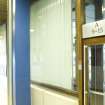 Interior view of Royal Commonwealth Pool, Edinburgh. Orignal glazed door and windows of the spectator's access gallery, giving access to the pool-side spectator seating.