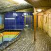 Interior view of Royal Commonwealth Pool, Edinburgh. View of plunge pool room within the later Sauna extension