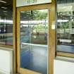 Interior view of Royal Commonwealth Pool, Edinburgh. Detail of original door to pool hall on SE corridor of spectator's access gallery.