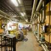 Interior view of Royal Commonwealth Pool, Edinburgh. View of basement level boiler room and filter plant to SW side of competition pool.