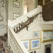 Interior. Stair hall, view from half landing to NE