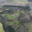 Oblique aerial view of Ayton Castle and policies, taken from the ESE.