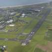 General oblique aerial view of the airport looking along runway 31, taken from the E.
