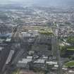 General oblique aerial view of the M74 extension looking towards the centre of Glasgow across the Polmaddie area, taken from the ESE.