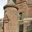 S end turret and entrance steps. View from SE