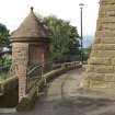 S turret and entrance steps. View from E