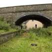 View from N showing bridge and new house on trackbed.