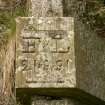Detail of carved flood level marker dated  '21 9 91', Plenploth North railway bridge