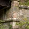 Detail of SE pier abutment showing inserted brickwork and string course.