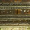 Detail of a section of the wooden underside decking with girders..