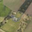 Oblique aerial view centred on the country house with the garden adjacent, taken from the NW.