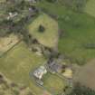 Oblique aerial view centred on the country house with the garden adjacent, taken from the S.