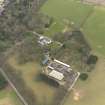 Oblique aerial view centred on the country house with the tower-house adjacent, taken from the NW.