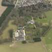 Oblique aerial view centred on the country house with the tower-house adjacent, taken from the WSW.