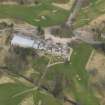 Oblique aerial view centred on the country house (hotel),  taken from the SW.